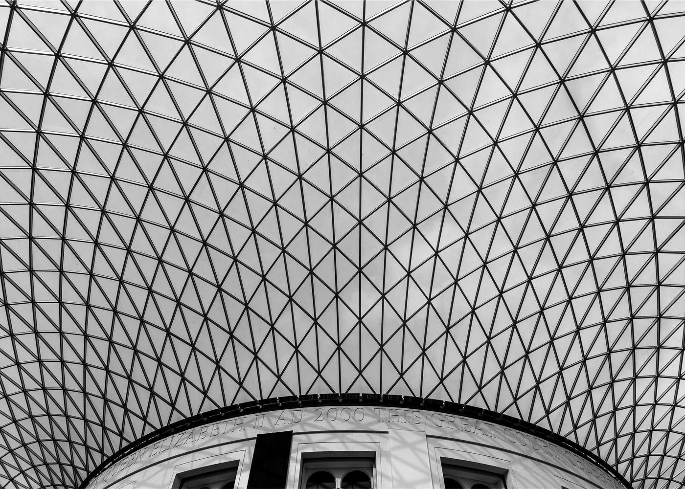A sweeping steel and glass structure, with each element supporting the whole